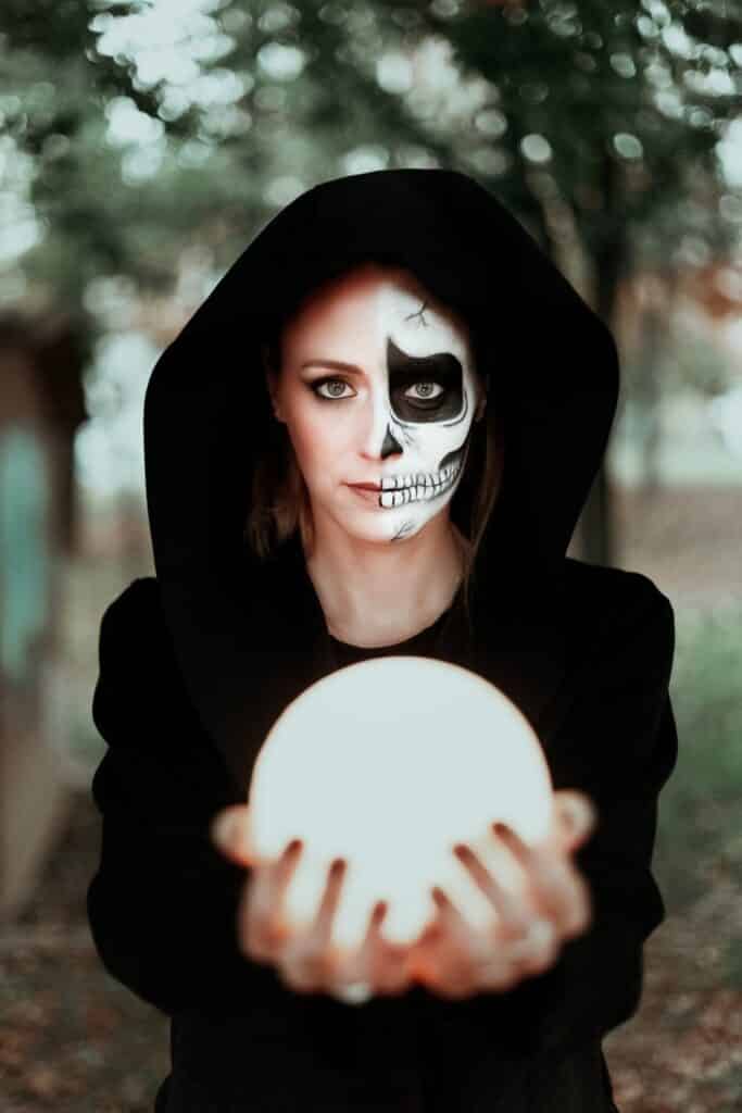 Photo Of Woman Holding Crystal Ball