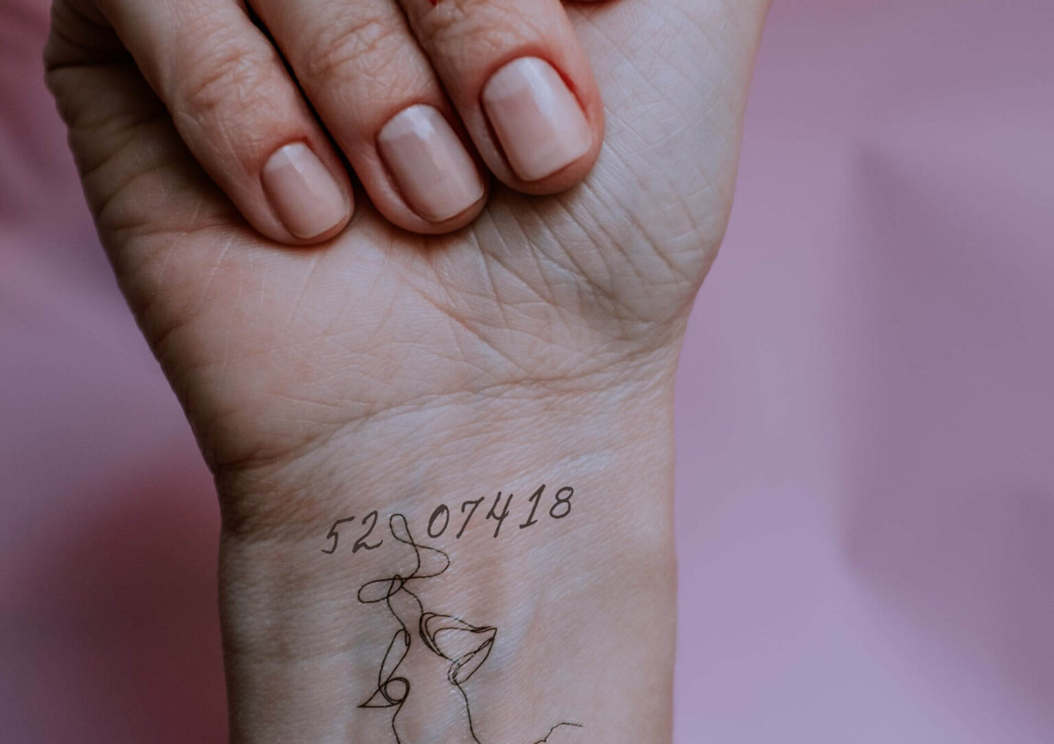 writing numbers on wrist